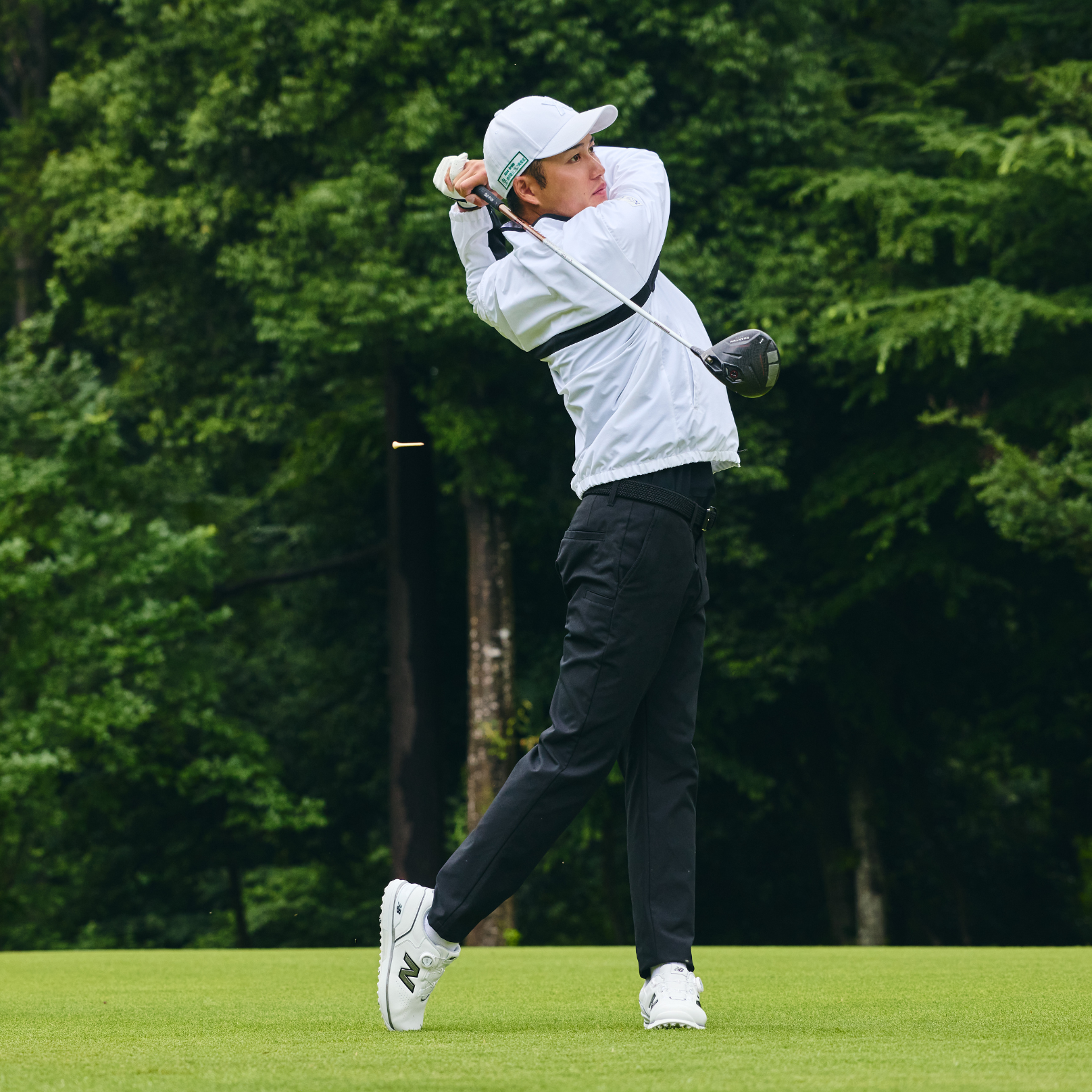 Ryunosuke Furukawa wearing FuelCell 3000 v2 on a golf course
